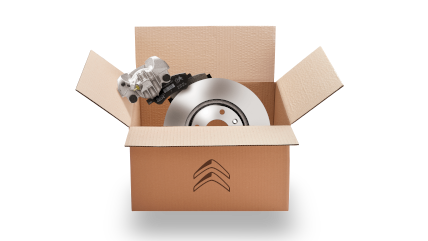 Carton avec pièces de rechange à l'intérieur